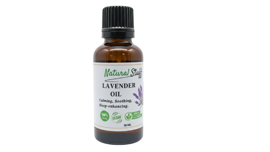 Bottle of lavender oil with a white label on a white background