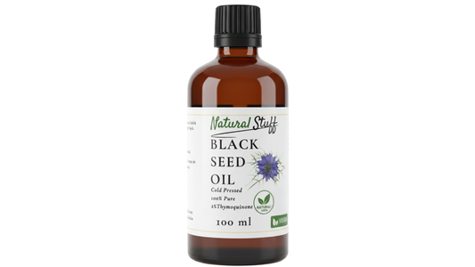 Bottle of Natural Stuff Black Seed Oil on a white background