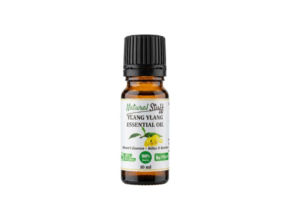 Bottle of Ylang Ylang essential oil with a white background