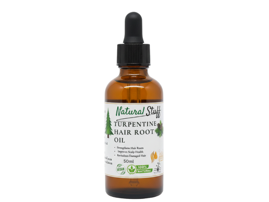 Bottle of Natural Stuff Turpentine Hair Root Oil with dropper on a white background