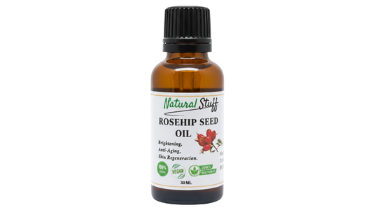 Bottle of Natural Stuff Rosehip Seed Oil on a white background