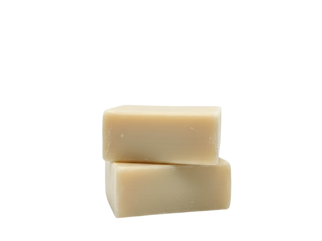 Two beige soap bars stacked on a white background