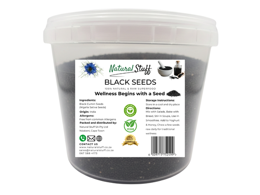 Container of black seeds with a label on a white background