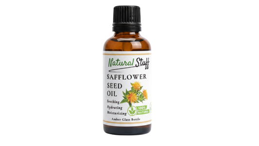 Bottle of safflower seed oil with a white label on a white background