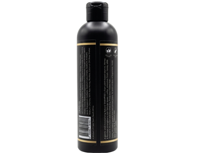 Black bottle with label on a white background
