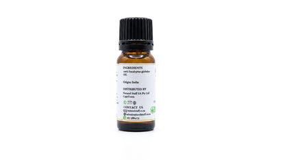 Small glass bottle with a black cap on a white background