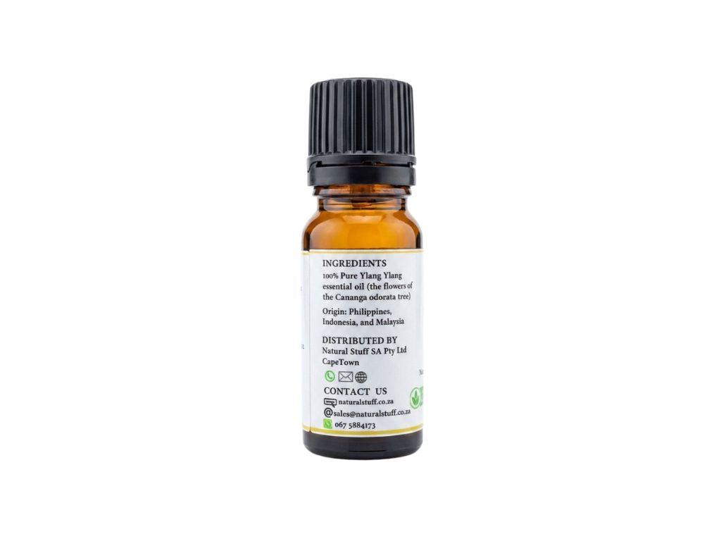 Small amber glass bottle with a black cap on a white background