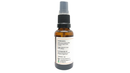 Brown spray bottle with a label on a white background