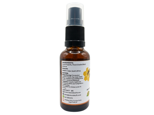 Brown spray bottle with label on a white background