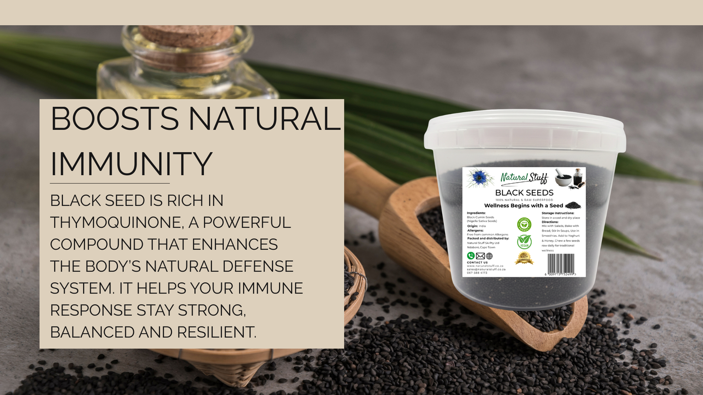 Container of black seeds with a label and text about boosting immunity on a textured surface.