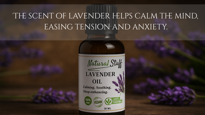 Bottle of Natural Stuff Lavender Oil with lavender flowers in the background