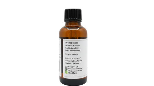 Brown glass bottle with black cap on a white background