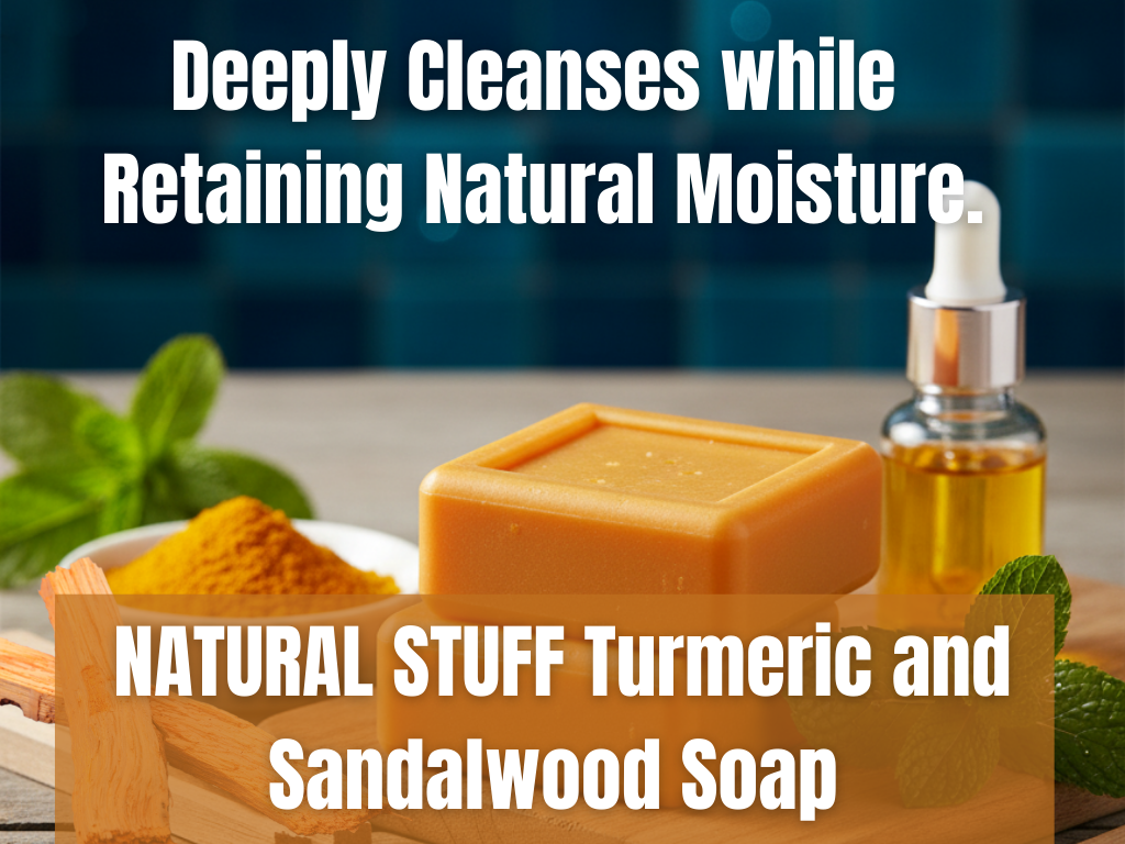 Turmeric and sandalwood soap with a bottle of oil on a wooden tray, surrounded by herbs.