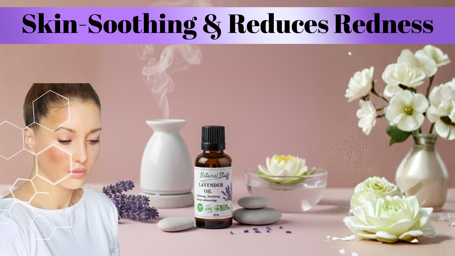 Aromatherapy setup with essential oil bottle, diffuser, and flowers on a pink background.