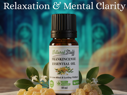 Frankincense essential oil bottle with leaves and resin on a blurred background