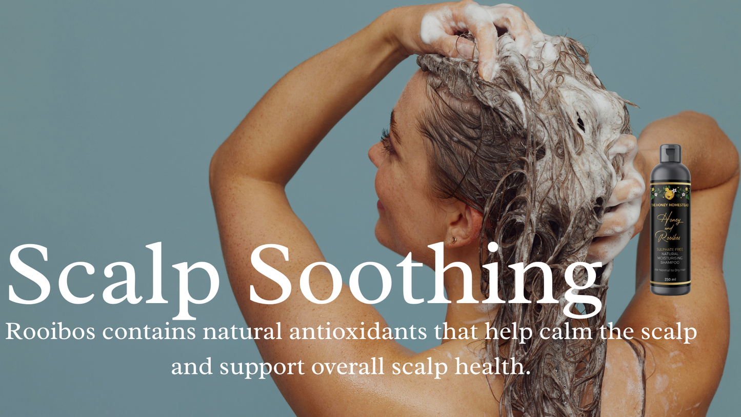 Person washing hair with a bottle labeled 'Scalp Soothing' on a gray background