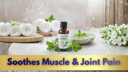 Bottle of peppermint essential oil with flowers and towels in a spa setting