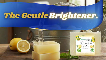 Glycerine soap with lemons and a bucket on a wooden surface, labeled 'The Gentle Brightener'.