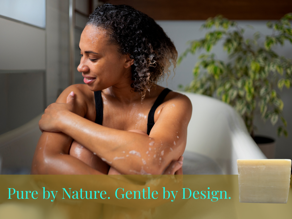 Woman in a bathtub with soap, with text 'Pure by Nature. Gentle by Design.'