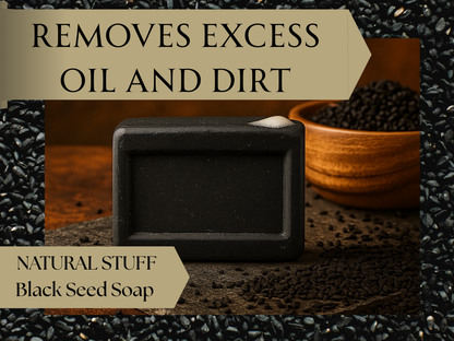 Black seed soap bar with a wooden cup and black seeds on a dark background, labeled 'Removes excess oil and dirt'.