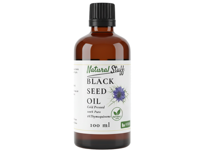 Bottle of Black Seed Oil with a label on a white background